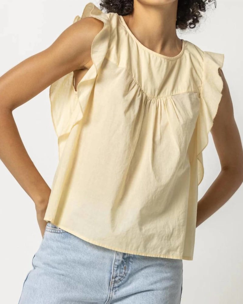 Front of a model wearing a size L Sleeveless Ruffle Top in Shell in Shell by Lilla P. | dia_product_style_image_id:364251
